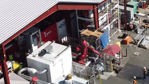 Industrial robot operating in a factory environment